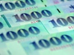 新台幣盤整 28日午升0.3分