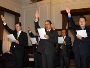 金應邀黨政會報 府駁情治干政