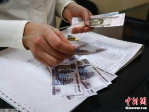 中國承諾援俄 盧布再彈8%<br />陸商務部長：可擴大貨幣互換規模